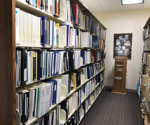 A large shelf stacked with books