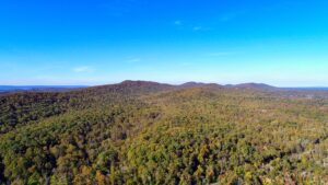 A wide-angle view of a mountains during autumn. 