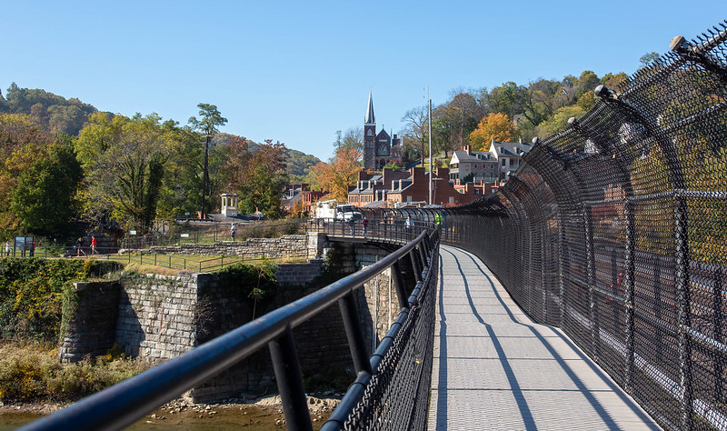 A pedestrian bridge crossing the Potomac River, overlooking Harpers Ferry.